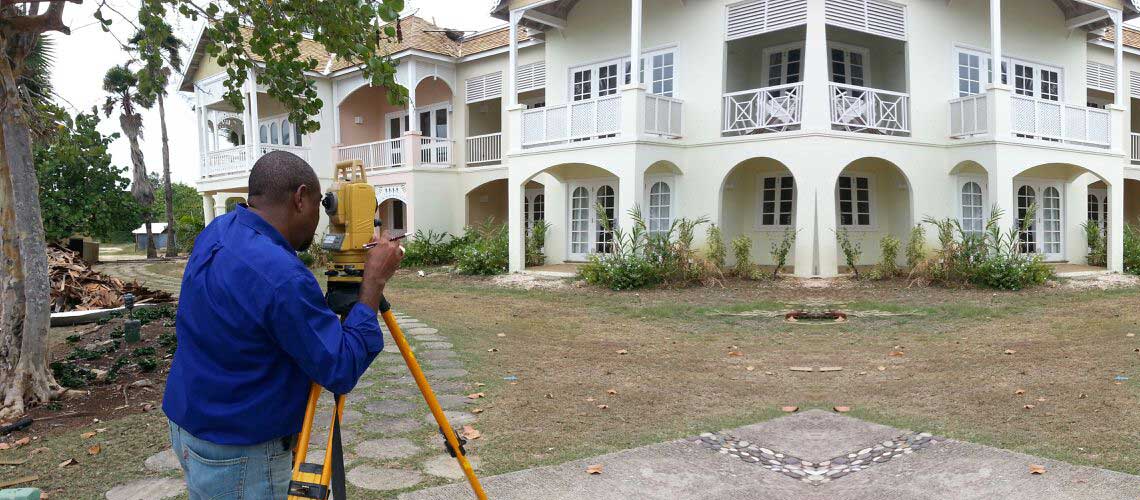 land surveyor surveying property